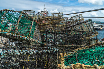 Stacked up Lobster and crab Pots next to Poole Harbour, Poole, UK