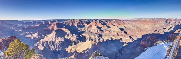 Fototapeta na wymiar Panorama picture over Grand Canyon with blue sky in Arizona