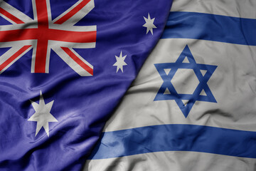 big waving realistic national colorful flag of australia and national flag of israel . © luzitanija