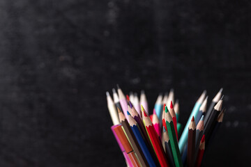 Kids desk creative workspace with school supplies, notebooks. Back to school concept. watercolor pencil need to bring for art class when you back to school.