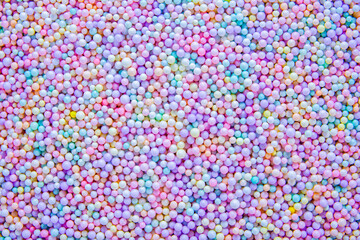 Fototapeta na wymiar Colorful foam beads texture background. Round multi color foam beads textured.