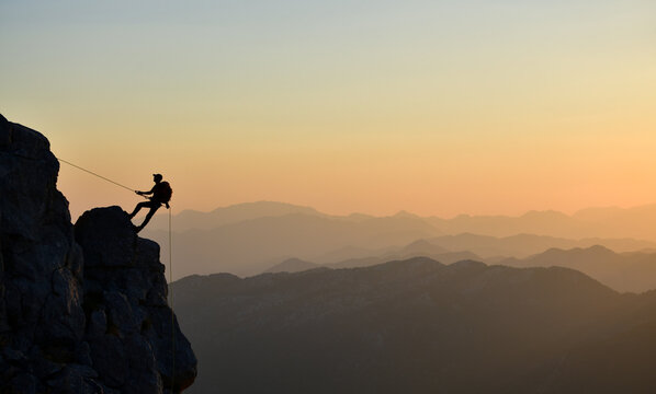 Climbing a Dangerous Rock