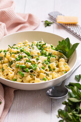 Savor the Flavors of Italy with Pasta e Piselli (Pea Macaroni): Hearty Italian Comfort Food with Creamy Green Peas, Nutty Parmesan, and Aromatic Tomato Sauce