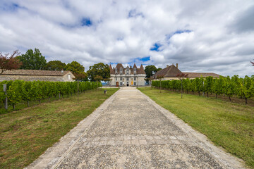 Monbazillac castle (Chateau de Monbazillac) with vineyard, Dordogne department, Aquitaine, France