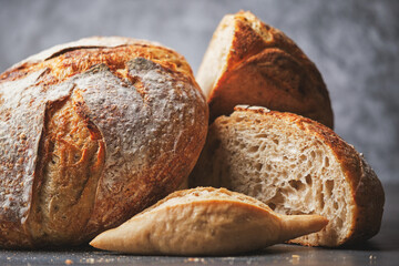 Organic sourdough breads with whole wheat flour - obrazy, fototapety, plakaty