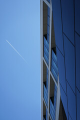 Fototapeta na wymiar Sky, building and plane