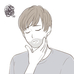 顎を触りながら目を閉じて髭の剛毛さに悩む若い男性