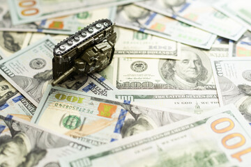 One Hundred Dollar Bill Ripped in Half Isolated on a White Background.