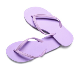 Pair of lilac flip-flops on white background