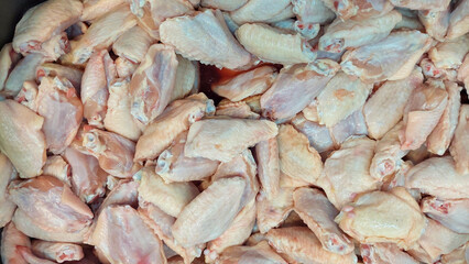 Fresh chicken joints in a tray ready for sale