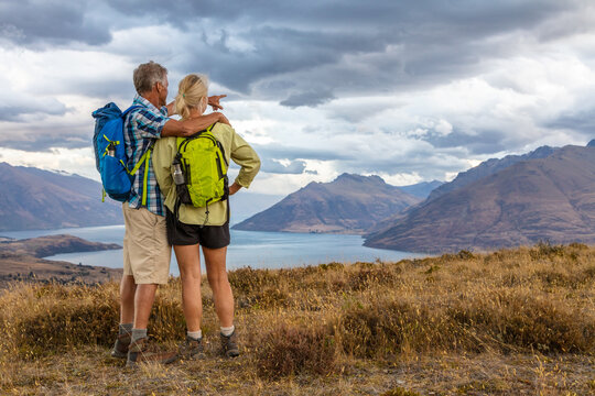 Loving mature male and female on hiking vacation