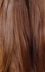 Brown uncombed long hair.