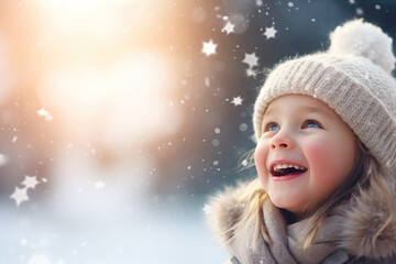 Happy girl enjoying snow. Winter banner with a girl and copy space.