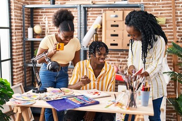 African american friends artists smiling confident drawing at art studio