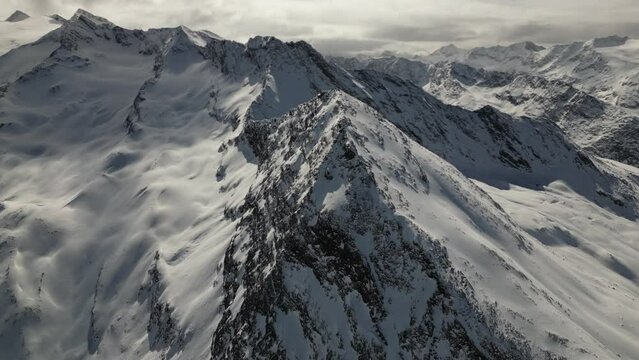 Landscape drone over Hangerer ridge glaciers in the Otztal Alps in winter in Austria