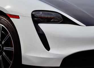 Beautiful sleek car closeup in the sunlight