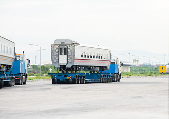 Transport of Oversize Heavy cargo trailera new passenger train on a multi-axle hydraulic modular...