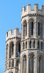 A closeup of old, historical Ely Cathedral Cambridgeshire on a sunny day under the blue sky