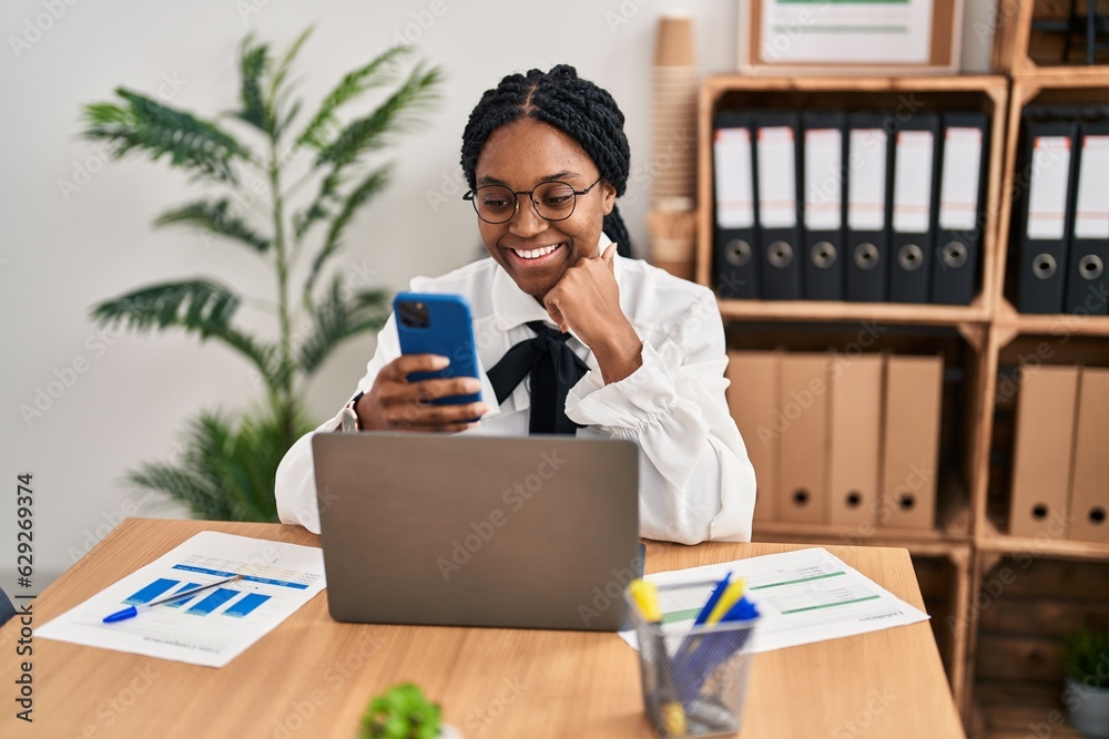 Poster African american woman business worker using laptop and smartphone at office