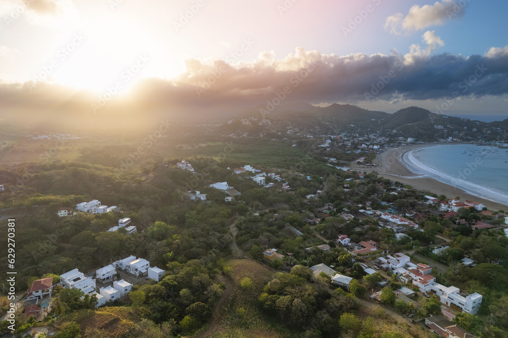 Canvas Prints sunrise over green hills of san juan del sur