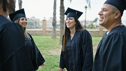 Group of people students graduated speaking at university campus