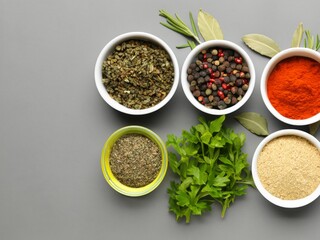 herbs and spices for cooking with gray background