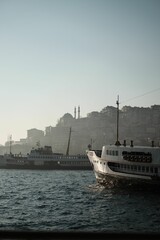 Fototapeta na wymiar Majestic ship sailing on the Bosphorus strait in Istanbul, Turkey