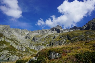a rocky country landscape under the cloudy sky