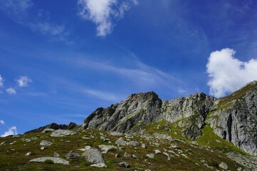 a rocky country landscape under the cloudy sky