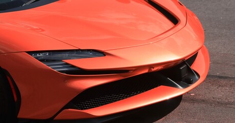 Sleek unbranded orange sports car