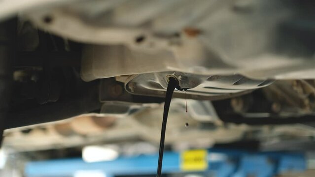 The oil is flowing from the engine under the car while the engine oil changes. To maintain and extend the life of the car.	