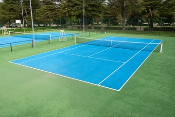 Blue Tennis court on a public park