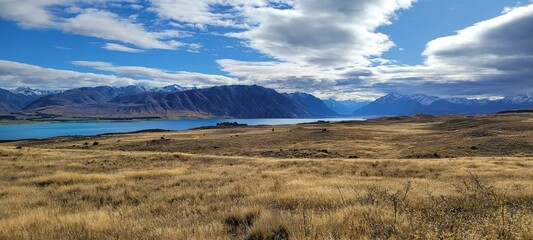 Idyllic landscape with a tranquil lake surrounded by majestic mountains