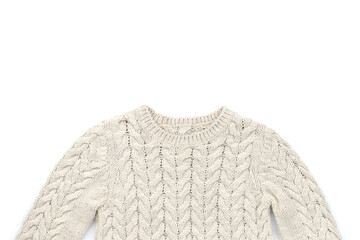 Obraz premium Womens beige sweater on white background. Flat lay top view