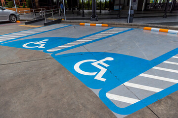 Parking for disabled or wheelchair. A sign indicates reserved parking for disabled people in a car...