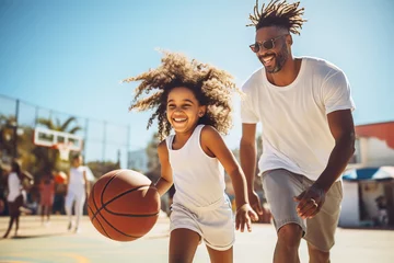 Zelfklevend Fotobehang African American Dad and daughter playing basketball on court. Joint family game leisure.  © colnihko