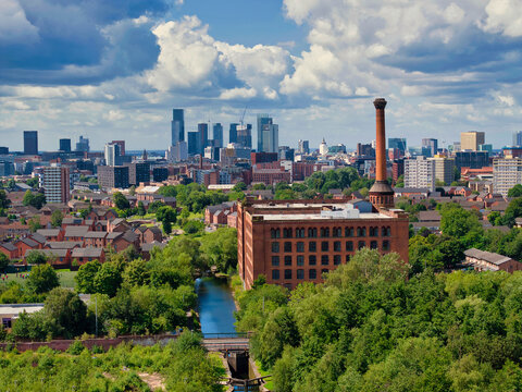 Manchester Skyline showing High rises and old architecture warehouse. 