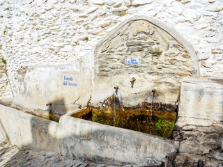 Del cerezo" fountain and washing place in Capileira village,, Spain