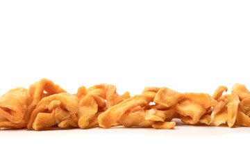 Dried melon slices isolated on a white background.