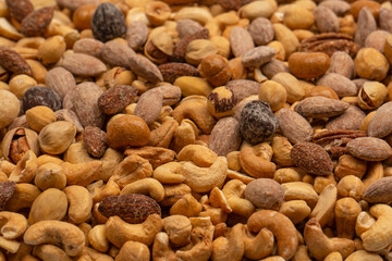 A group of almonds, pistachios, walnuts, macadamia, cashews.