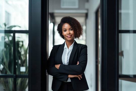 black business exectutive woman standing in office 
