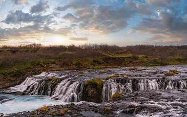 Picturesque waterfall Bruarfoss autumn view. Season changing in southern Highlands of Iceland.