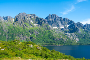 Amazing view at Lofoten islands Austvagoya, Austnesfjorden, Norway. Fjord summer landscape travelers rest area. Nordland, Coastline sea, ocean with mountains in background