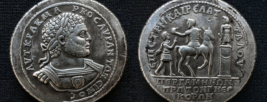 Ancient Roman medallion of Emperor Caracalla minted in Pergamum, macro view of vintage coin, theme of texture and Rome