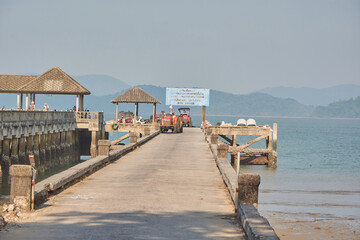 Pier in a thailand´s island ko phayam with tractor
