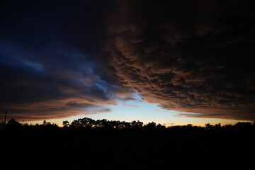 Storm clouds developed heavy rain and lighting.