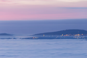 View of Perugia Umbria above a sea of fog at dusk - 629332901