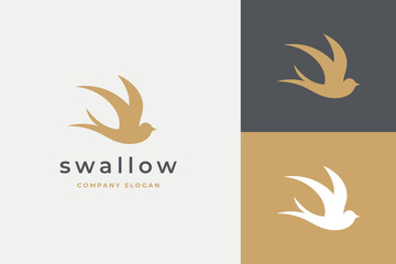 Fototapeta na wymiar Swallow Bird Silhouette Logo 