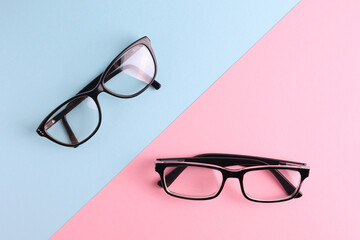 glasses for vision correction on a colored background with space for text