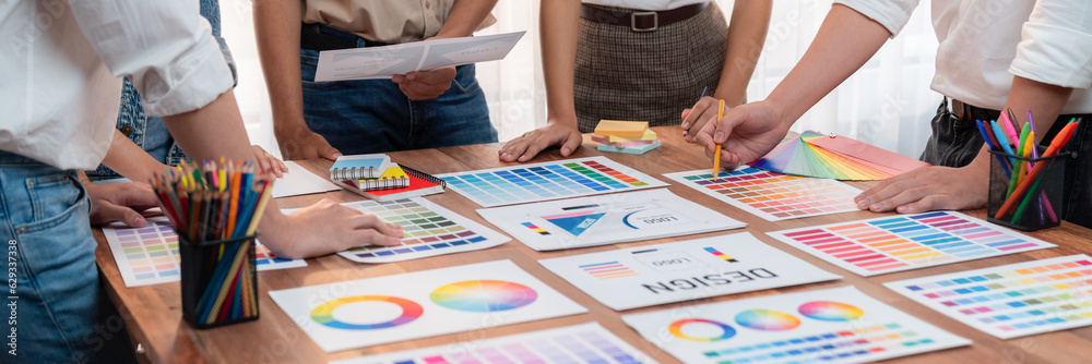 Poster graphic designer brainstorm logo and graphic art at busy creative studio workshop. experiment and br